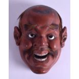 A 19TH CENTURY JAPANESE MEIJI PERIOD LACQUERED NOH MASK depicting a male. 20 cm x 16 cm.