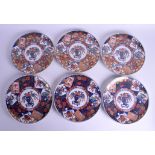 A SET OF SIX EARLY 20TH CENTURY JAPANESE MEIJI PERIOD IMARI PLATES painted with flowers and vines.