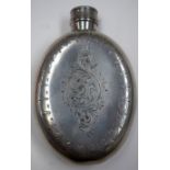 A SILVER PLATED HIP FLASK, engraved with foliage. 12.5 cm x 8.5 cm.