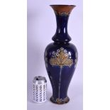 A LARGE 19TH CENTURY DOULTON STONEWARE BALUSTER VASE decorated with floral sprays. 43 cm high.