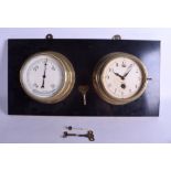 AN EARLY 20TH CENTURY MERCER DOUBLE HANGING WALL CLOCK. Each dial 16 cm wide, overall 60 cm wide.