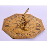 A CONTINENTAL BRASS SUN DIAL. 21 cm x 21 cm.