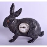 A RARE VINTAGE GERMAN SILVER PLATED RABBIT CLOCK of naturalistic form. 15 cm x 15 cm.