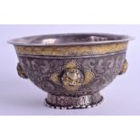 AN 18TH/19TH CENTURY CHINESE TIBETAN SILVER BUDDHISTIC BOWL decorated with mask heads. 208 grams. 1
