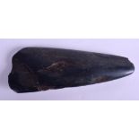 AN EARLY EUROPEAN CARVED STONE FLINT AXE HEAD TOOL. 15 cm x 6 cm.