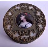 A GOOD 19TH CENTURY FRENCH ORMOLU AND LIMOGES ENAMEL BOX painted with a gypsy female wearing hoop e