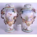 A VERY LARGE PAIR OF 19TH CENTURY MEISSEN DRESDEN VASES AND COVERS painted with figures holding a b