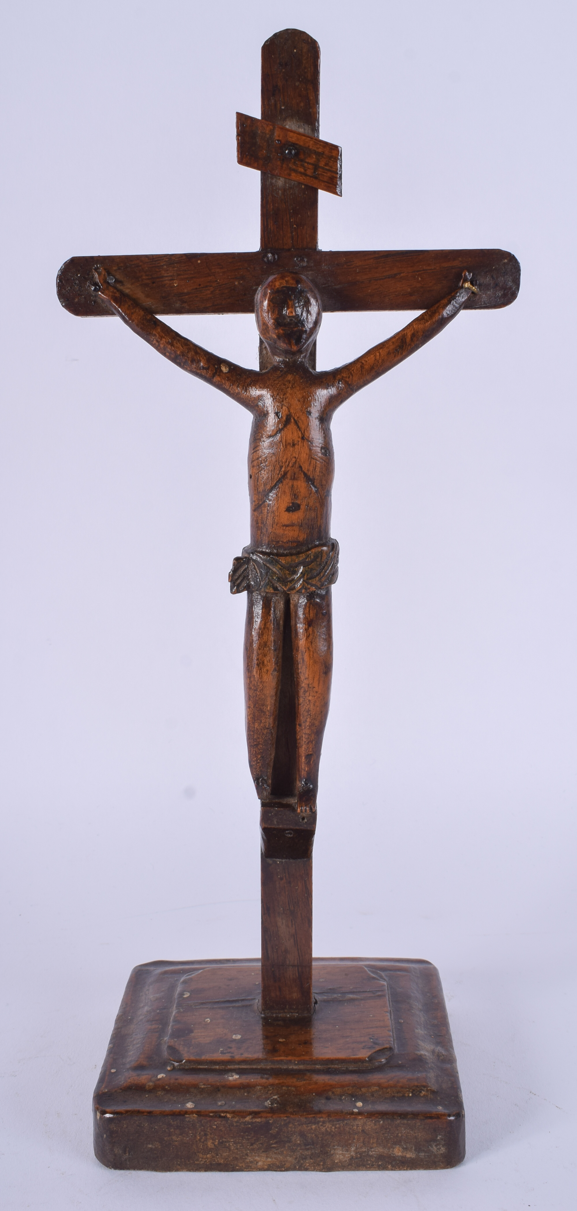 AN 18TH CENTURY CONTINENTAL FRUITWOOD FOLK ART CRUCIFIX. 30 cm x 11 cm.