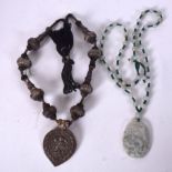 A CHINESE JADEITE NECKLACE, formed with spherical beads, together with a white metal necklace. (2)