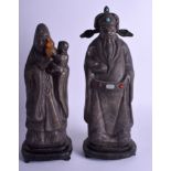 A PAIR OF EARLY 20TH CENTURY CHINESE SILVER FIGURES OF IMMORTALS embellished in hardstone. 1280 gra