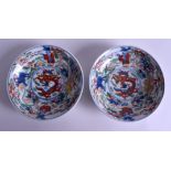 A PAIR OF 19TH CENTURY CHINESE WUCAI PORCELAIN DISHES Qing, painted with dragons and figures. 13.5
