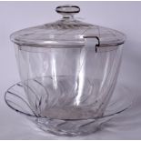 AN ART DECO CUT GLASS PUNCH BOWL AND COVER, cut with radiating vertical lines above a band of styli