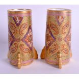 A PAIR OF MINIATURE ANTIQUE COALPORT CASHMERE VASES painted in the Middle Eastern style. 8 cm high.