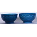 A PAIR OF CHINESE BLUE GLAZED PORCELAIN LOTUS BOWL, bearing Qianlong marks to base. 12.5 cm wide.