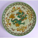 AN ART DECO CROWN DUCAL DRAGON CHARGER by Charlotte Rhead. 35 cm diameter.