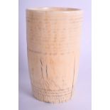 A 17TH CENTURY EUROPEAN CARVED IVORY RIBBED BEAKER C1670 of plain form. 171 grams. 9.5 cm x 5.5 cm.