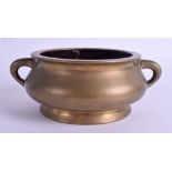 AN 18TH CENTURY CHINESE TWIN HANDLED BRONZE CENSER bearing Xuande marks to base. 1203 grams. 13 cm