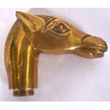 AN EARLY 20TH CENTURY BRASS WALKING STICK HANDLE IN THE FORM OF A HORSE HEAD. 8.5 cm x 10.5 cm.