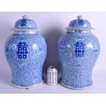 A LARGE PAIR OF 19TH CENTURY CHINESE BLUE AND WHITE BALUSTER JARS AND COVERS Qing. 44 cm x 21 cm.
