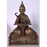 A LARGE CHINESE BRONZE STATUE OR BUDDHA, modelled seated upon a throne holding a ruyi sceptre. 32 c