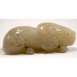 A 20TH CENTURY CHINESE HARDSTONE MYTHICAL BEAST, modelled upon all fours. 8 cm wide.