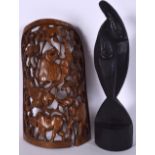 A LARGE CARVED WOODEN ZOOMORPHIC PANEL, together with an abstract bust of two lovers. Largest 44 cm