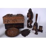 A CARVED TRIBAL CASKET, together with a wooden monkey, case etc. (qty)