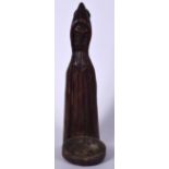 A 19TH CENTURY CARVED BLACK FOREST OAK FIGURAL CANDLESTICK HOLDER, in the form of a standing druid