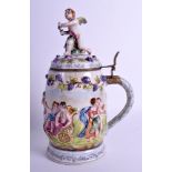 AN EARLY 20TH CAPO DI MONTE PORCELAIN NAPLES TANKARD decorated in relief with figures. 23.5 cm high