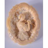 A 19TH CENTURY CONTINENTAL CARVED IVORY BROOCH. 4 cm x 5.25 cm.