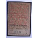 A MID 19TH CENTURY FRAMED SAMPLER depicting houses and trees. Image 28 cm x 41 cm.