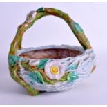 AN ANTIQUE ROYAL WORCESTER MAJOLICA BASKET C1860 of naturalistic form. 18 cm x 16 cm.