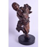 A 19TH CENTURY CHINESE CARVED ROOT WOOD FIGURE OF AN IMMORTAL of naturalistic form. Figure 21 cm hi
