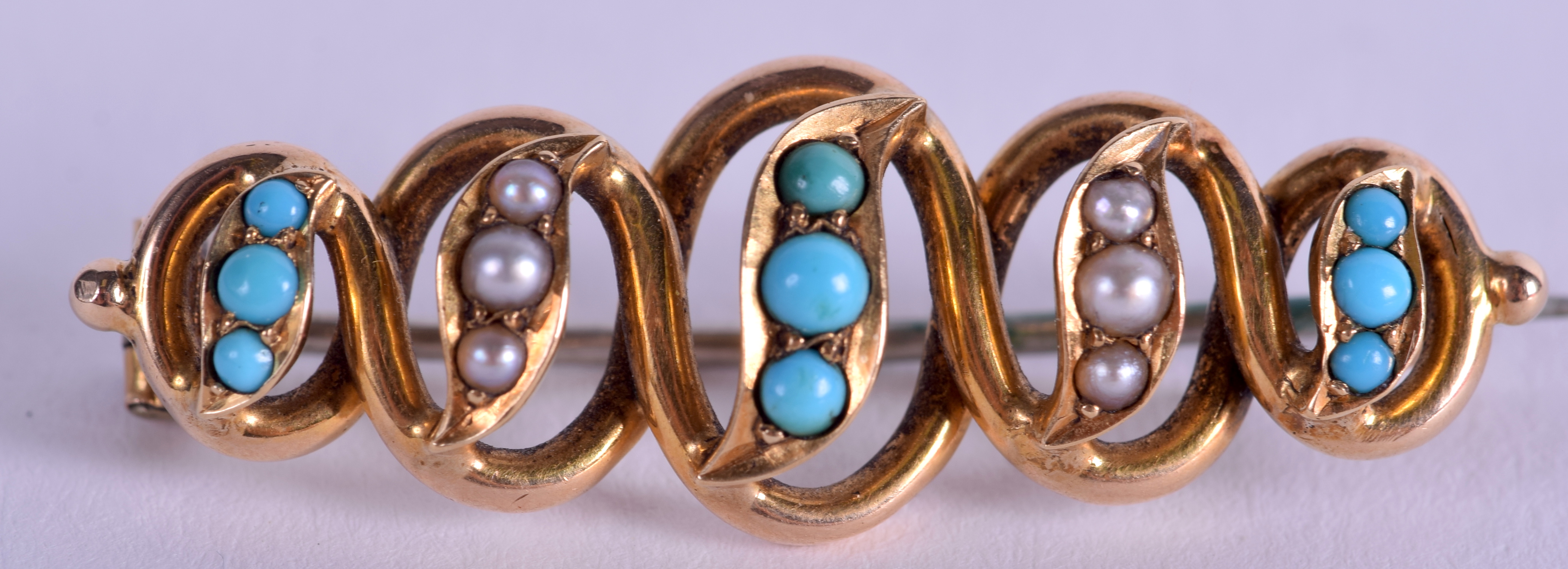 AN ANTIQUE 15CT GOLD TURQUOISE AND PEARL BROOCH. 4.8 grams. 3.75 cm wide.