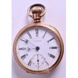 AN ANTIQUE WALTHAM YELLOW METAL POCKET WATCH. 5 cm wide.