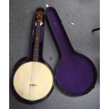 AN ANTIQUE BANJO, in original case. 80 cm long.