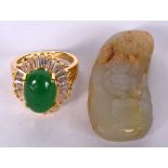 A CHINESE MUTTON JADE CARVING, together with an apple jade inset ring. Carving 4.5 cm. (2)