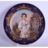 AN EARLY 20TH CENTURY AUSTRIAN VIENNA PORCELAIN CABINET PLATE painted with a female beside a founta