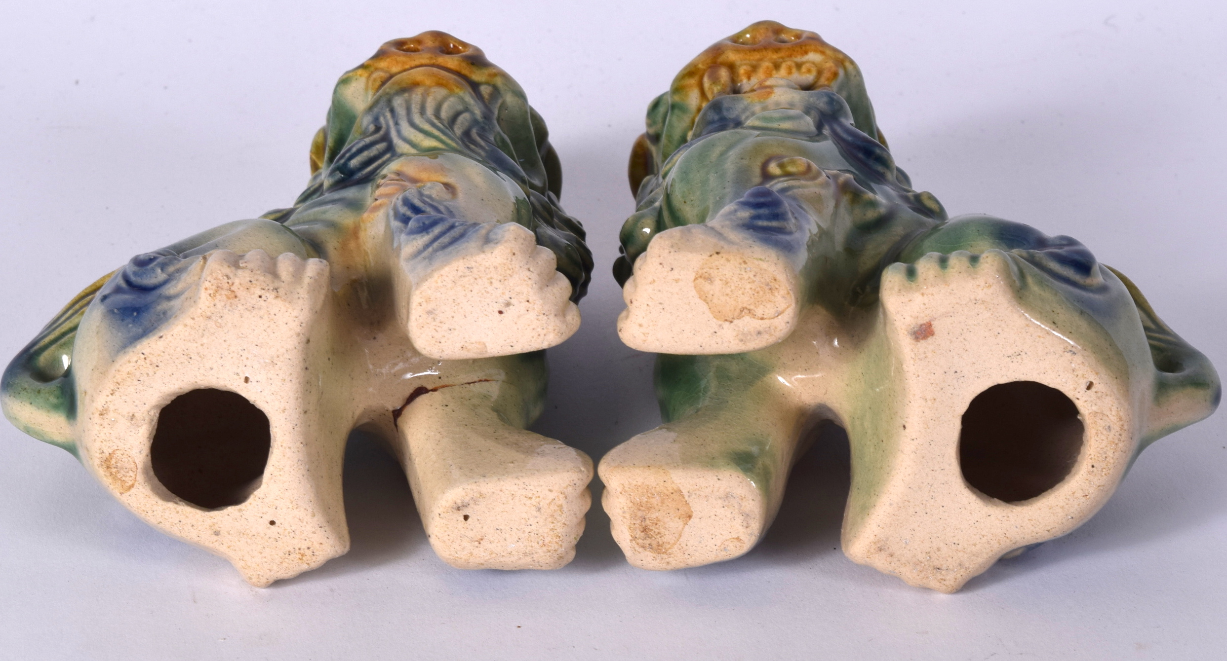 A PAIR OF CHINESE GREEN GLAZED PORCELAIN DOGS OF FOE OR FOO DOG, formed in imposing stance. 15 cm h - Image 2 of 2