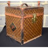 A RARE VINTAGE FRENCH LOUIS VUITTON TOP HAT BOX with some original labels. 38 cm x 35 cm x 41 cm.