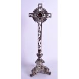 A LARGE 19TH CENTURY CONTINENTAL SILVER PLATED RELIQUARY CRUCIFIX inset with an enamelled medallion