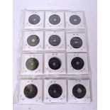 TWELVE CHINESE BRONZE COINS, each decorated with calligraphy. 3 cm wide.