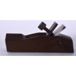 A NOVELTY BRONZE WOODWORKING PLANE. 8.5 cm wide.