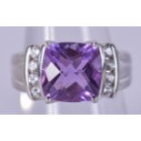 AN 18CT WHITE GOLD AND AMETHYST RING. Size N. 7.2 grams.