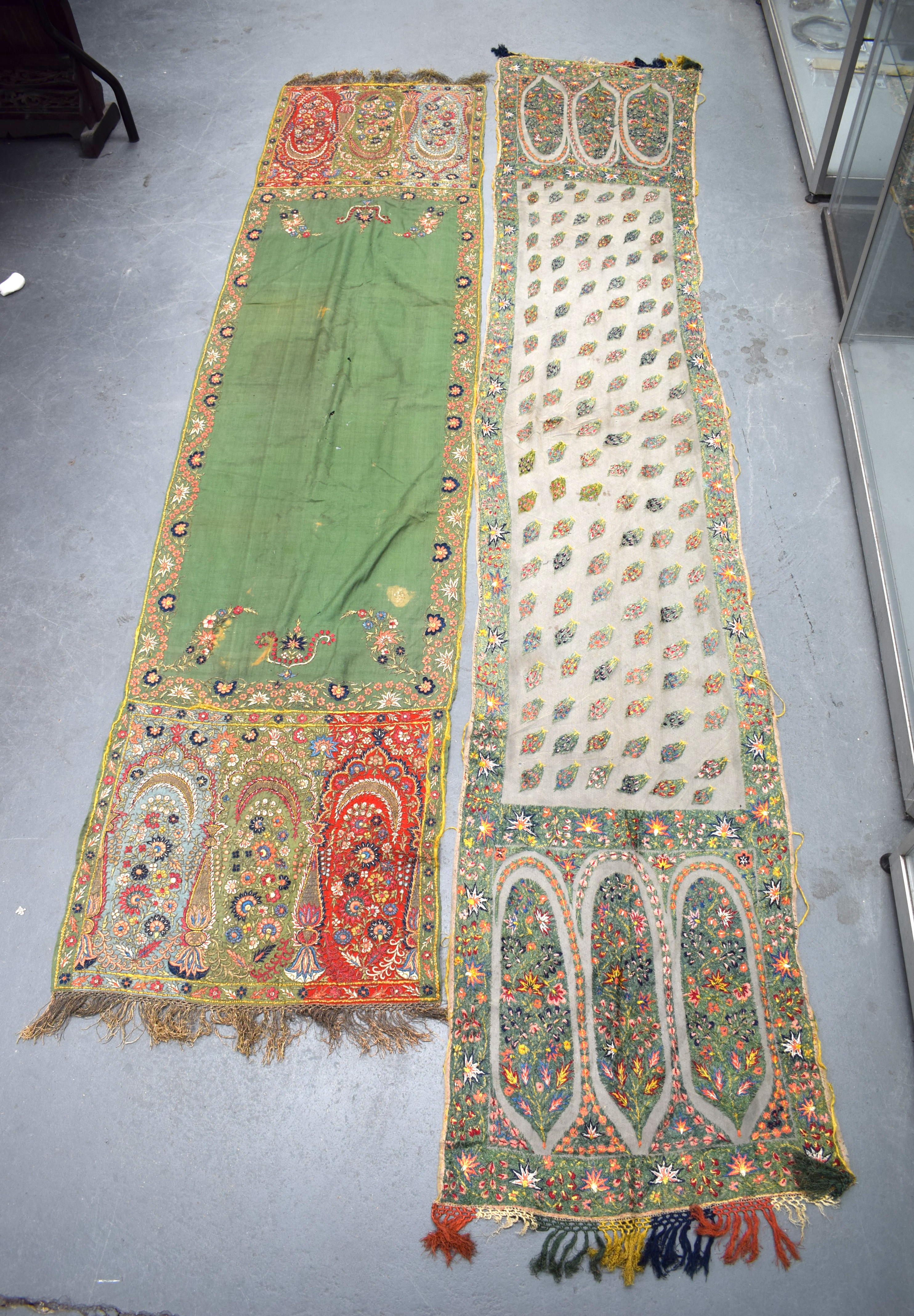 TWO 19TH CENTURY KASHMIRI SILK EMBROIDERED SHAWLS decorated with foliage. (2)