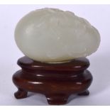 A CHINESE WHITE JADE BOULDER, carved in relief with insects and foliage. 4 cm wide.