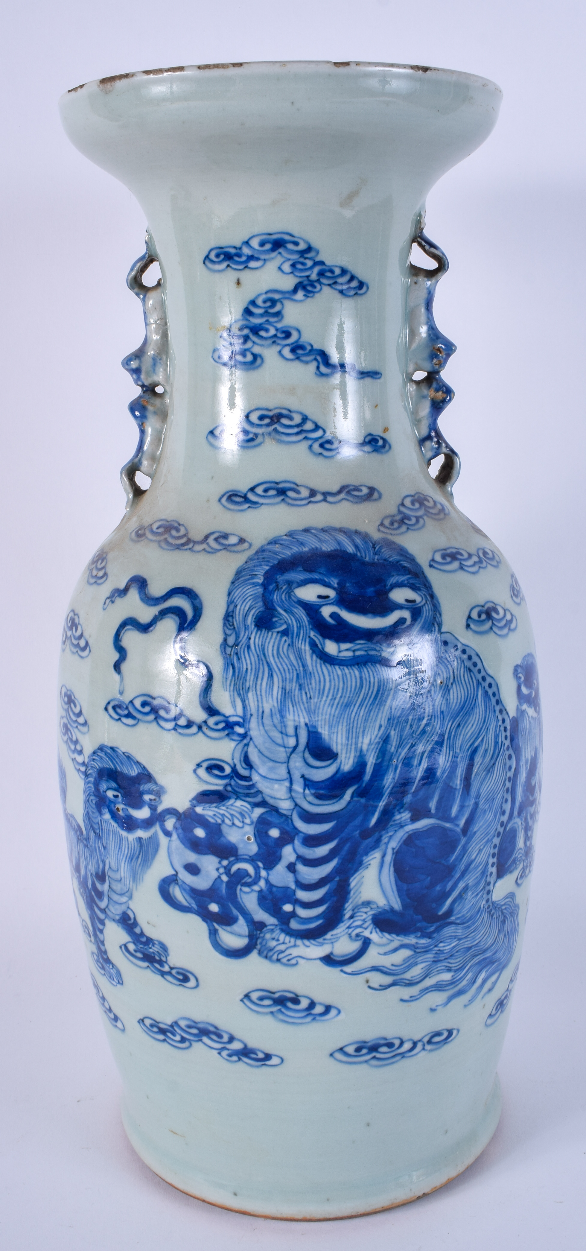 A LARGE 19TH CENTURY CHINESE TWIN HANDLED CELADON VASE Qing, painted with Buddhistic lions. 44 cm x