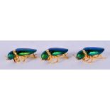 THREE 1950S JEWELLED SCARAB BROOCHES. 4 cm long. (3)