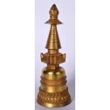 A 20TH CENTURY TIBETAN GILT BRONZE STUPA, formed with a double beaded lotus base. 25.5 cm.