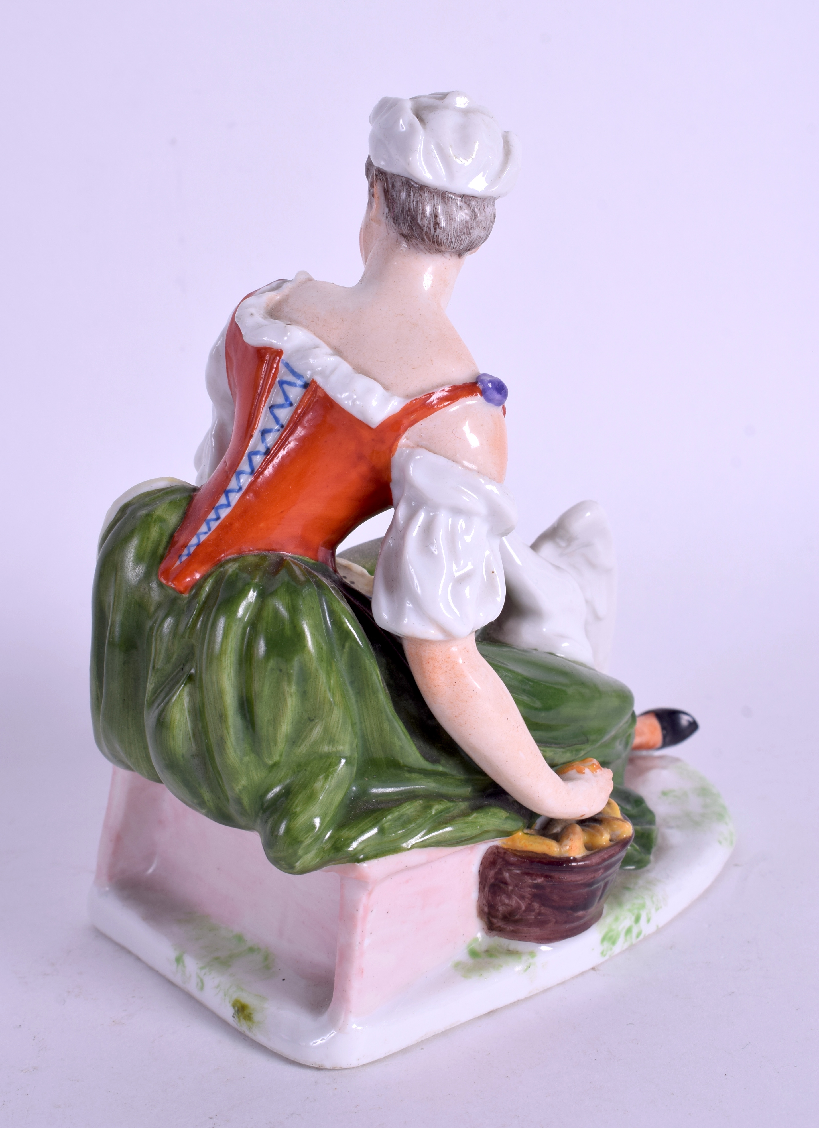 A 19TH CENTURY GERMAN SITZENDORF FIGURE OF A FEMALE modelled beside swans. 13 cm x 15 cm. - Image 2 of 3